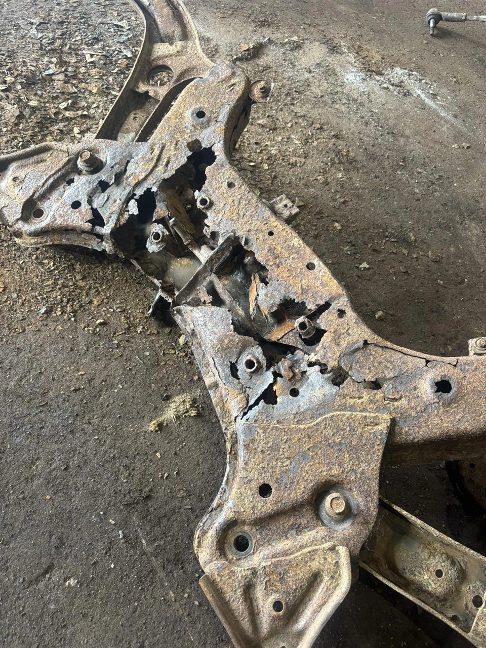 Corroded engine cradle after years on Newfoundland roads